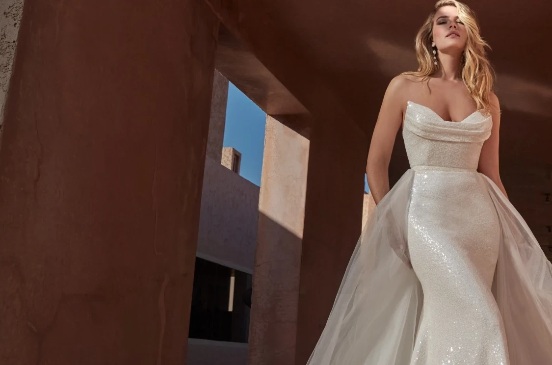 Photo of model wearing A Madison James gown. Mobile image