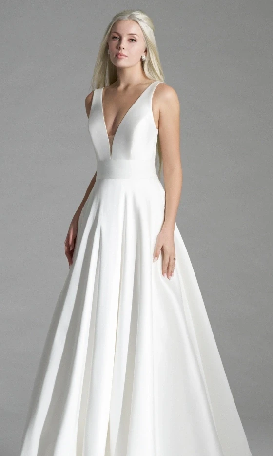 Model wearing a Simple Elegance Style gown. Desktop image