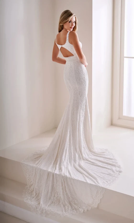 Model wearing a Flattering Back Style gown. Desktop image